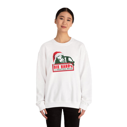 DIE HARD'S A CHRISTMAS MOVIE Unisex Heavy Blend™ Crewneck Sweatshirt